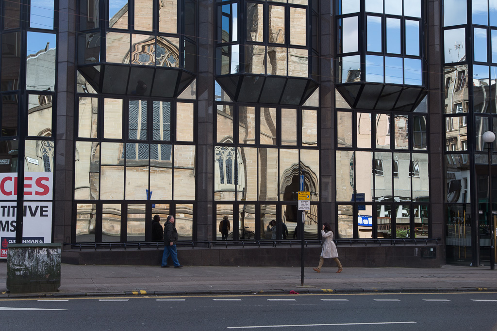 Reflection of Renfield St Stephens Parish Church in glass of building across the street.